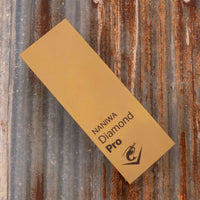 Naniwa Diamond Pro stone with grit #6000 is an extra fine splash-and-go diamond plate that is excellent for knife sharpening. Whereas many diamond stones have a single thin layer, the Naniwa Diamond Pro stones have a layer 1mm thick. This allows the stone to effectively "shed" worn layers, offering a fresh grit layer.