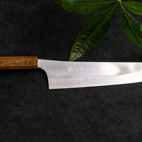 Kurosaki Gyuto from the Gekko line is made by master blacksmith Yu Kurosaki. The minimalistic, lightweight, perfectly balanced blade is treated to a high polish − hence the name Gekkō (月光) which means moonlight in Japanese. VG-XEOS steel (61 HRC), which has excellent resistance to wear and corrosion.