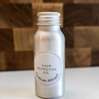 end grain walnut cutting board, handmade in Slovenia. Pictured: Included mineral wood protection oil.