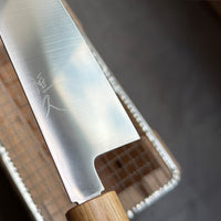 This Harukaze 210mm (8.3") Gyuto’s blade, at just 2mm (0.08"), is among the thinnest we have in our range. The knife has an immaculate "out of the box" sharpness, laser-thin spine of the blade, good balance and offers a lightweight feeling while in use. VG-1 steel is synonymous with efficiency and durability and is extremely easy to maintain as the blade is completely stainless. Unlike other knives, this knife is not laminated and is made entirely of one steel, being of so-called "monosteel" construction.