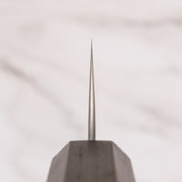 Close-up of the choil of the Hayabusa Gyuto VG-10 Tsuchime Damascus 210mm knife.