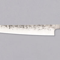 Hokiyama Sujihiki SLD Nashiji 240mm (9.5") is made from semi-stainless SLD steel that combines ease of maintenance with impressively long edge retention. The minimalistic blade finish is a combination of nashiji and matte migaki. Its length makes it perfect as a gift and for all those who prefer smaller mighty blades.