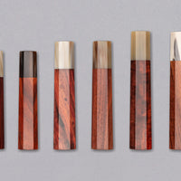 A traditional Japanese handle in an octagonal shape made from sandalwood, with a blonde buffalo horn ferrule. Suitable for both left- and right-handed users.
Combine the handle with any standalone blade to create your very own custom Japanese kitchen knife!