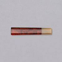 A traditional Japanese handle in an octagonal shape made from sandalwood, with a blonde buffalo horn ferrule. Suitable for both left- and right-handed users.
Combine the handle with any standalone blade to create your very own custom Japanese kitchen knife!