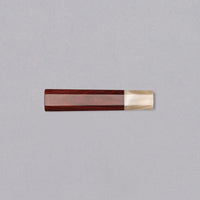 A traditional Japanese handle in an octagonal shape made from sandalwood, with a blonde buffalo horn ferrule. Suitable for both left- and right-handed users.
Combine the handle with any standalone blade to create your very own custom Japanese kitchen knife!