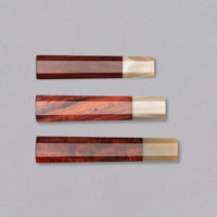 A traditional Japanese handle in an octagonal shape made from sandalwood, with a blonde buffalo horn ferrule. Suitable for both left- and right-handed users.
Combine the handle with any standalone blade to create your very own custom Japanese kitchen knife!
