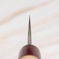 The striking collection by brand Masakage and blacksmith Yoshimi Kato is called Yuki - snow. The subtle whiteness of the blade and magnolia handle are designed to remind of a snowy winter landscape. With a carbon steel core and stainless outer layers, this line represents the perfect blend of beauty and performance.