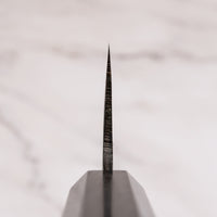 Close-up of the choil of the Kokugei Gyuto Aogami #1 Kuro-uchi Ebony 210mm, showcasing the blade’s geometry.