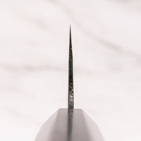 Close-up of the choil of the Kokugei Gyuto Aogami #1 Kuro-uchi Ebony 240mm, showcasing the geometry of the blade.