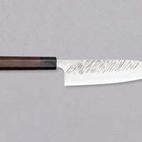 Kurosaki Santoku Fujin is another uniquely looking blade from the hands of the talented young master blacksmith Yu Kurosaki. Made from SG2 powder steel, the blade is adorned with a unique tsuchime pattern and fitted with a rosewood handle. Optimal for everyday, versatile use, whether you are a home cook or a pro chef.