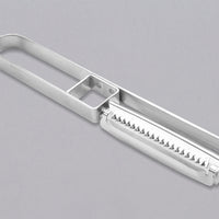 This medium version of the Julienne peeler, SSK-13, from Japanese manufacturer Suncraft is made of very sharp, precise, and thin stainless steel. A Julienne peeler is a quick and safe tool for making thin julienne strips of vegetables, especially harder veggies like carrots, zucchini, potatoes, sweet potatoes, etc. Great for making garnishes, salad toppings, stir-fries, potato hash browns, citrus zest, and more. Total length: 190mm (7.5")