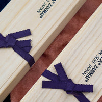 The Mcusta Zanmai Supreme Twisted Knife Set offers great versatility, featuring two multi-purpose knives that cover most cutting tasks in the kitchen. The minimalistic, highly polished blades are made of low-maintenance stainless VG-10 steel and are designed to put the focus on the uniquely shaped twisted handle.