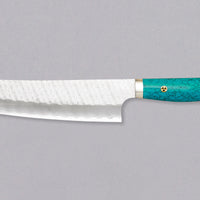 Nigara Kiritsuke-Gyuto SG2 Tsuchime is a multi-purpose Japanese kitchen knife, suitable for preparing meat, fish, and vegetables. Its SG2 powder steel core ensures long-lasting sharpness with little to no maintenance, as the steel resists corrosion very well. Browse our large selection of handcrafted Japanese knives!