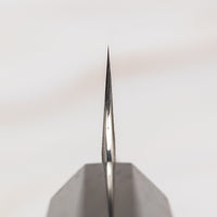 Nigara Kiri-Petty AS Migaki Tsuchime is a small multi-purpose Japanese kitchen knife, suitable for meat, fish and vegetables. Due to its easy-to-resharpen Aogami Super steel core (63 HRC) it keeps sharp for a long time. The beautiful combination of tsuchime, migaki and kasumi finishes makes this blade functional art.