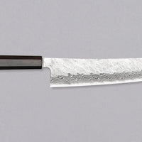 Nigara Kiritsuke Gyuto VG-10 Damascus Tsuchime 240mm (9.4") is a multi-purpose Japanese kitchen knife, suitable for preparing meat, fish, and vegetables. VG-10 stainless steel ensures a fine sharpness with little to no maintenance. As such, the knife is also suitable as a first Japanese knife or gift. Fitted with an ebony handle.