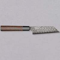 Nigara Kiritsuke Petty SG2 Damascus 120mm is a Japanese kitchen knife suitable for smaller cutting tasks. It's adorned with a raindrop damascus pattern and fitted with a wenge wood handle. Its SG2 powder steel core ensures long-lasting sharpness with little to no maintenance, as the steel resists corrosion very well.