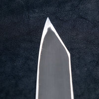 Nigara Kurozome Kiritsuke Yanagiba Aogami #2 Damascus 240mm (9.4") is a traditional single-bevel Japanese knife used for preparing meat and raw fish, especially sashimi and nigiri sushi, and meat. Its length allows the user to slice different types of protein in one single pulling motion, that will – together with the razor-sharp single bevel blade – birth smooth, shiny cuts.