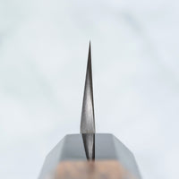 The quality and craftsmanship of this Nigara Kurozome Yanagiba Aogami #2 Damascus 270mm (10.6") is simply superb - from the beautifully polished choil to the unique damascus pattern that surrounds the spine of the blade and extends to its back. The outer layers of the blade have a pearl mosaic-like appearance, which you won't find often even in the most high-end blades.