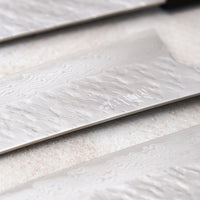 Nigara Hamono VG-10 Damascus Tsuchime line of knives.