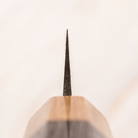 The Saji Petty VG-10 Gold RWO 135 mm is a small Japanese kitchen knife suitable for preparing meat, fish and vegetables. However, it would be an injustice to call it just a kitchen knife, as it is a remarkable example of blacksmith's craftsmanship - from its unique design to its very specific features.