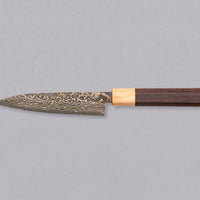 The Saji Petty VG-10 Gold RWO 135 mm is a small Japanese kitchen knife suitable for preparing meat, fish and vegetables. However, it would be an injustice to call it just a kitchen knife, as it is a remarkable example of blacksmith's craftsmanship - from its unique design to its very specific features.