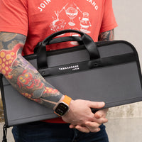 Tamahagane Chef's Knife Bag / holds 7 knives ; The Tamahagane knife bag is an excellent choice for professionals and home-cooking enthusiasts who want to have their knives ready in no time whenever occasion requires. The bag contains 7 separate pockets for kitchen knives and other cooking utensils.
