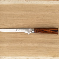 Presenting a knife designed specifically for the difficult task of separating meat from bone. Suitable for various types of meat - for trimming, boning and other butchering work. The blade length is 160 mm. Suitable for cooking enthusiasts and professional chefs alike. The core of the blade has a high-polish finish and is forged out of VG-5 (High Carbon Molybdenum Vanadium Steel) steel hardened to 61 HRC.