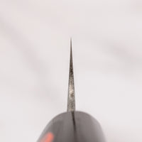 The minimalistic, lightweight petty was forged by the famous Shigeki Tanaka. It comes in a traditional Japanese paulownia wood box and makes a truly special gift. The superior Aogami #2 steel ensures long-lasting sharpness and easy sharpening. It's fitted with a traditional magnolia handle in D-shape.