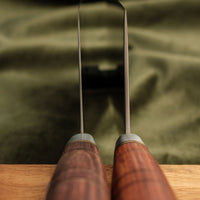 Side-by-side comparison of thick and standard Chinese cleaver blades.