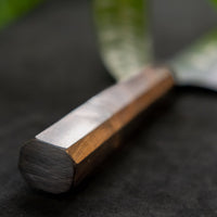 Kurosaki Bunka Gekko from the Gekko line is the work of a talented master blacksmith Yu Kurosaki. The minimalistic, lightweight, perfectly balanced blade is treated to a high polish. The knife features new VG-XEOS steel (61 HRC), which has excellent resistance to wear and corrosion, and is fitted with an oak handle.