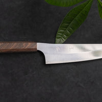 Kurosaki Bunka Gekko from the Gekko line is the work of a talented master blacksmith Yu Kurosaki. The minimalistic, lightweight, perfectly balanced blade is treated to a high polish. The knife features new VG-XEOS steel (61 HRC), which has excellent resistance to wear and corrosion, and is fitted with an oak handle.