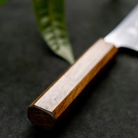 Kurosaki Nakiri from the Gekko line is another uniquely looking blade from the hands of a talented young master blacksmith Yu Kurosaki. The minimalistic, lightweight blade is treated to a high polish. The secret of this knife lies in a new VG-XEOS steel (61 HRC), which has excellent resistance to wear and corrosion.