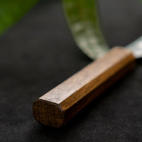 Kurosaki Petty from the Gekko line is another special blade from the hands of a talented young master blacksmith Yu Kurosaki. The minimalistic blade is treated to a high polish − hence the name Gekkō (月光), moonlight in Japanese. Made from VG-XEOS steel (61 HRC), it has excellent resistance to wear and corrosion.