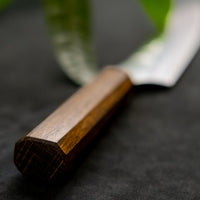 Kurosaki Sujihiki Gekko from the Gekko line is the work of a talented master blacksmith Yu Kurosaki. The minimalistic, lightweight, perfectly balanced blade is treated to a high polish. The knife features new VG-XEOS steel (61 HRC), which has excellent resistance to wear and corrosion, and is fitted with an oak handle.