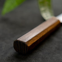 Kurosaki Sujihiki Gekko from the Gekko line is the work of a talented master blacksmith Yu Kurosaki. The minimalistic, lightweight, perfectly balanced blade is treated to a high polish. The knife features new VG-XEOS steel (61 HRC), which has excellent resistance to wear and corrosion, and is fitted with an oak handle.