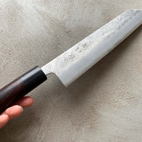 Hokiyama Kiritsuke Ginsanko 210mm (8.3")_6 Hokiyama Kiritsuke Ginsanko 210mm (8.3") is a multi-purpose Japanese kitchen knife. The Kiritsuke blade shape is a multifunctional Japanese kitchen knife, suitable for everyday use and the 210mm (8.3") blade length is an optimal size for chopping vegetables as well as cutting larger pieces of meat and fish. 63 HRC!