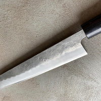 Hokiyama Kiritsuke Ginsanko 210mm (8.3")_7 Hokiyama Kiritsuke Ginsanko 210mm (8.3") is a multi-purpose Japanese kitchen knife. The Kiritsuke blade shape is a multifunctional Japanese kitchen knife, suitable for everyday use and the 210mm (8.3") blade length is an optimal size for chopping vegetables as well as cutting larger pieces of meat and fish. 63 HRC!