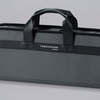 Tamahagane Chef's Knife Bag / holds 7 knives ; The Tamahagane knife bag is an excellent choice for professionals and home-cooking enthusiasts who want to have their knives ready in no time whenever occasion requires. The bag contains 7 separate pockets for kitchen knives and other cooking utensils.