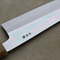 Kawamura Mizu-Honyaki Gyuto is a hand-forged masterpiece. Crafted with incredible precision, it is not simply a Japanese knife but a piece of art. On one side it is adorned with Mt Fuji and a full moon, which is replaced with a crescent on the other. A stunning collector's item, this Shirogami #2 steel honyaki blade with a rainbow sheen is forged from a single piece of high-carbon Yasuki Shirogami (White Steel) #2.