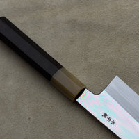 Kawamura Mizu-Honyaki Gyuto is a hand-forged masterpiece. Crafted with incredible precision, it is not simply a Japanese knife but a piece of art. On one side it is adorned with Mt Fuji and a full moon, which is replaced with a crescent on the other. A stunning collector's item, this Shirogami #2 steel honyaki blade with a rainbow sheen is forged from a single piece of high-carbon Yasuki Shirogami (White Steel) #2.