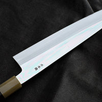 Kawamura Mizu-Honyaki Gyuto is a hand-forged masterpiece. Crafted with incredible precision, it is not simply a Japanese knife but a piece of art. On one side it is adorned with Mt Fuji and a full moon, which is replaced with a crescent on the other. A stunning collector's item, this Shirogami #2 steel honyaki blade with a rainbow sheen is forged from a single piece of high-carbon Yasuki Shirogami (White Steel) #2.