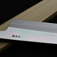 Kawamura Mizu-Honyaki Gyuto is a hand-forged masterpiece. Crafted with incredible precision, it is not simply a Japanese knife but a piece of art. On one side it is adorned with Mt Fuji and a full moon, which is replaced with a crescent on the other. A stunning collector's item, this Shirogami #2 steel honyaki blade with a rainbow sheen is forged from a single piece of high-carbon Yasuki Shirogami (White Steel) #2.