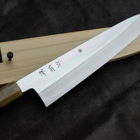 Kawamura Mizu-Honyaki Gyuto is a hand-forged masterpiece. Crafted with incredible precision, it is not simply a Japanese knife but a piece of art. On one side it is adorned with Mt Fuji and a full moon, which is replaced with a crescent on the other. A stunning collector's item, this Shirogami #2 steel honyaki blade with a rainbow sheen is forged from a single piece of high-carbon Yasuki Shirogami (White Steel) #2.