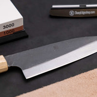 The Neverending Sharpness Bundle I [rosewood] has everything you need to get started on your Japanese knife-owning, sharpen-it-yourself journey: A basic sharpening set with a whetstone of two grits [#1000/3000] and a knife that is easy to sharpen and keep sharp long-term.