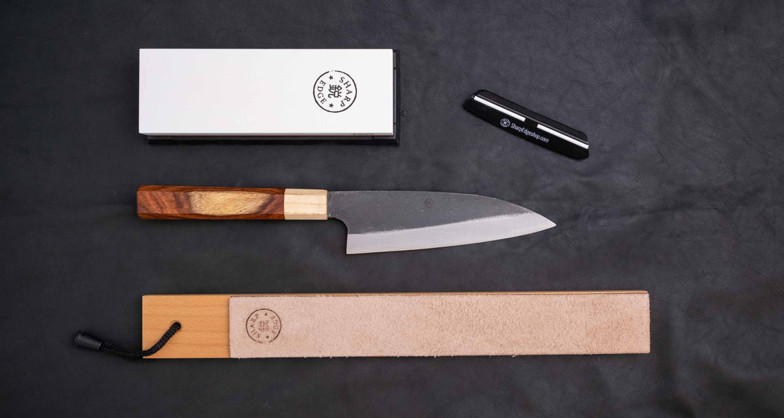 The Neverending Sharpness Bundle I [rosewood] has everything you need to get started on your Japanese knife-owning, sharpen-it-yourself journey: A basic sharpening set with a whetstone of two grits [#1000/3000] and a knife that is easy to sharpen and keep sharp long-term.