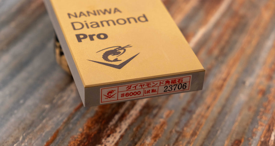 Naniwa Diamond Pro stone with grit #6000 is an extra fine splash-and-go diamond plate that is excellent for knife sharpening. Whereas many diamond stones have a single thin layer, the Naniwa Diamond Pro stones have a layer 1mm thick. This allows the stone to effectively "shed" worn layers, offering a fresh grit layer.