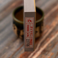 Naniwa Diamond Pro stone with grit #6000 is an extra fine splash-and-go diamond plate that is excellent for knife sharpening. Whereas many diamond stones have a single thin layer, the Naniwa Diamond Pro stones have a layer 1mm thick. This allows the stone to effectively "shed" worn layers, offering a fresh grit layer.