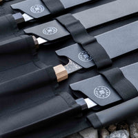 Our SharpEdge Black Chef's Knife Roll is best suited for chefs on-the-go and home cooks who need a sturdy knife roll that can hold very long knives (up to 440mm (17.3")). It has 6 pockets for knives and utensils, and additional velcro fasteners to keep them in place. A minimalistic, durable black knife bag. Get yours.