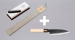 sharpening set: whetstone with angle guide, leather strop and santoku knife