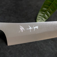 Kurosaki Gyuto from the Gekko line is made by master blacksmith Yu Kurosaki. The minimalistic, lightweight, perfectly balanced blade is treated to a high polish − hence the name Gekkō (月光) which means moonlight in Japanese. VG-XEOS steel (61 HRC), which has excellent resistance to wear and corrosion.